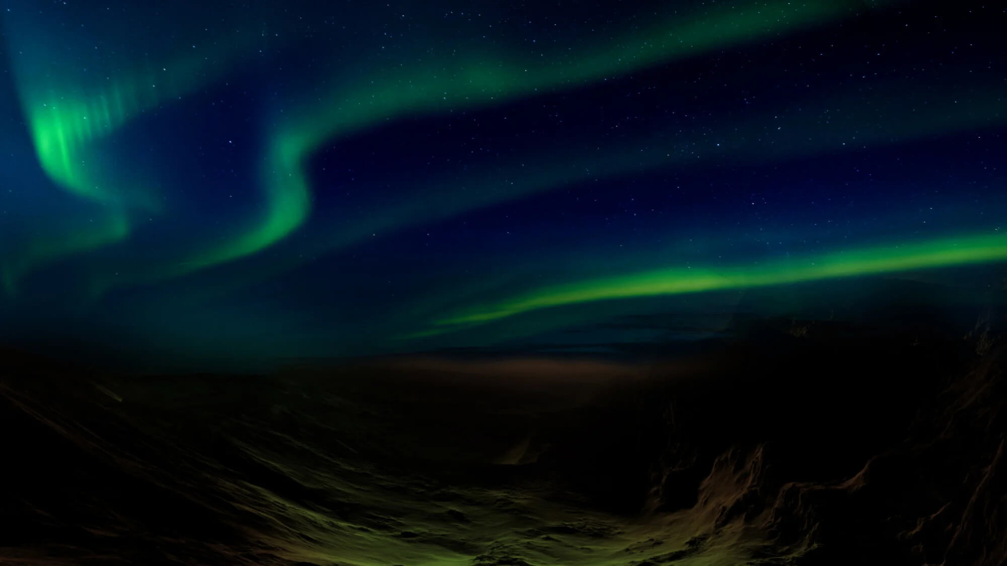 green wormlike aurora streaking Martian sky